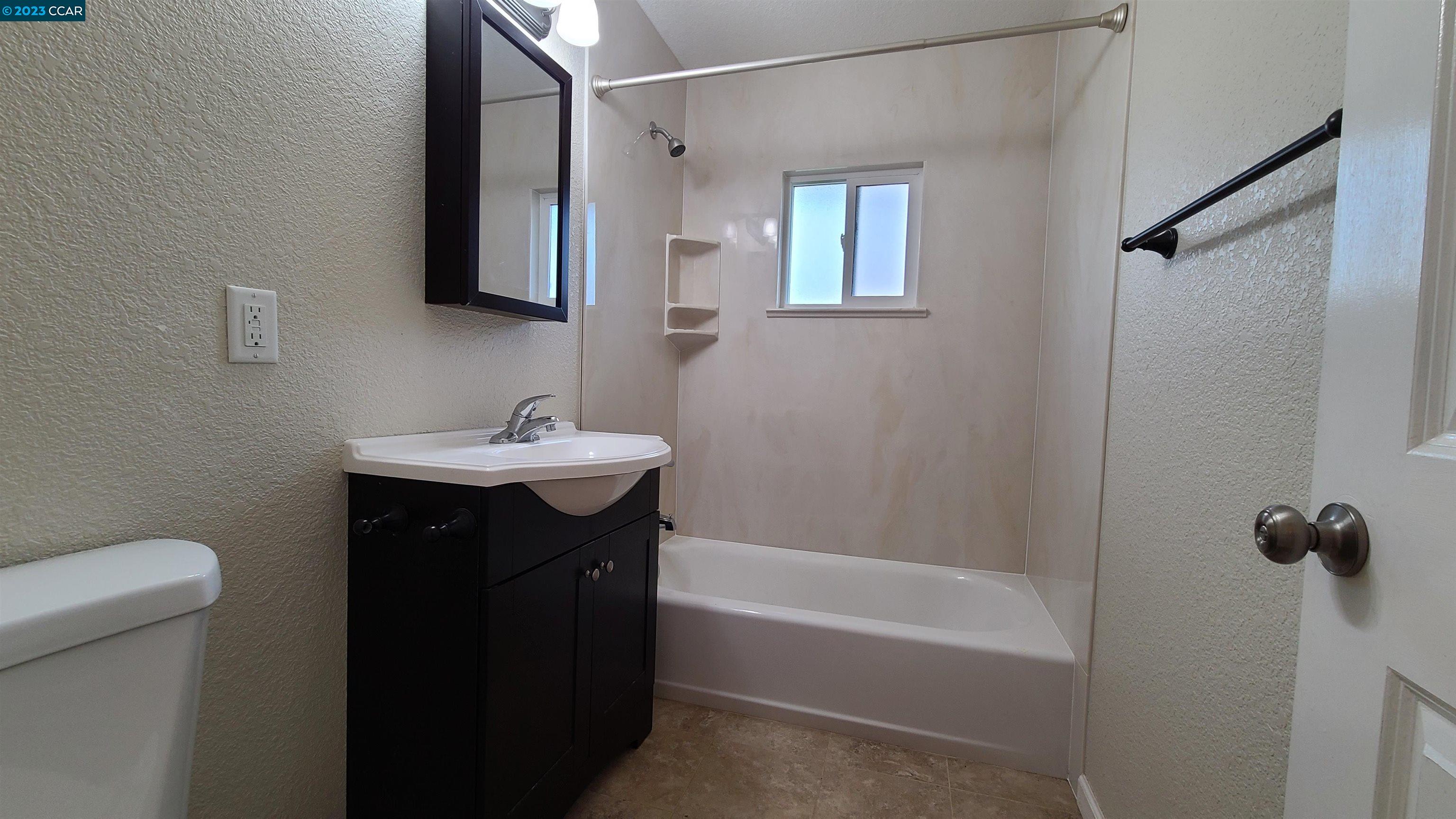 1972 Helen Road Pleasant Hill, CA 94523 - Photo 4 of 15 a bathroom with a sink toilet and shower