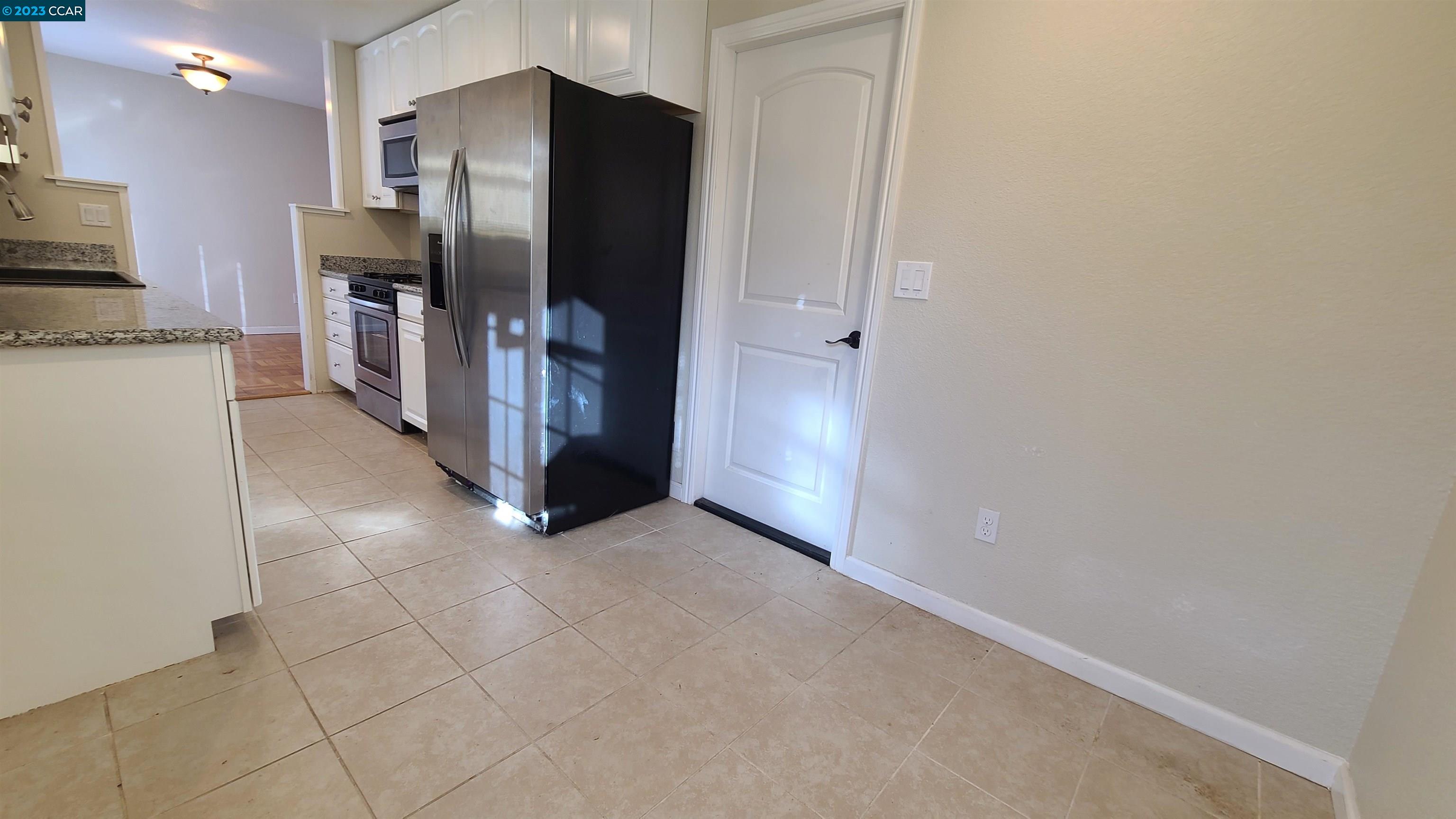 1972 Helen Road Pleasant Hill, CA 94523 - Photo 10 of 15 a view of a kitchen with refrigerator and stove