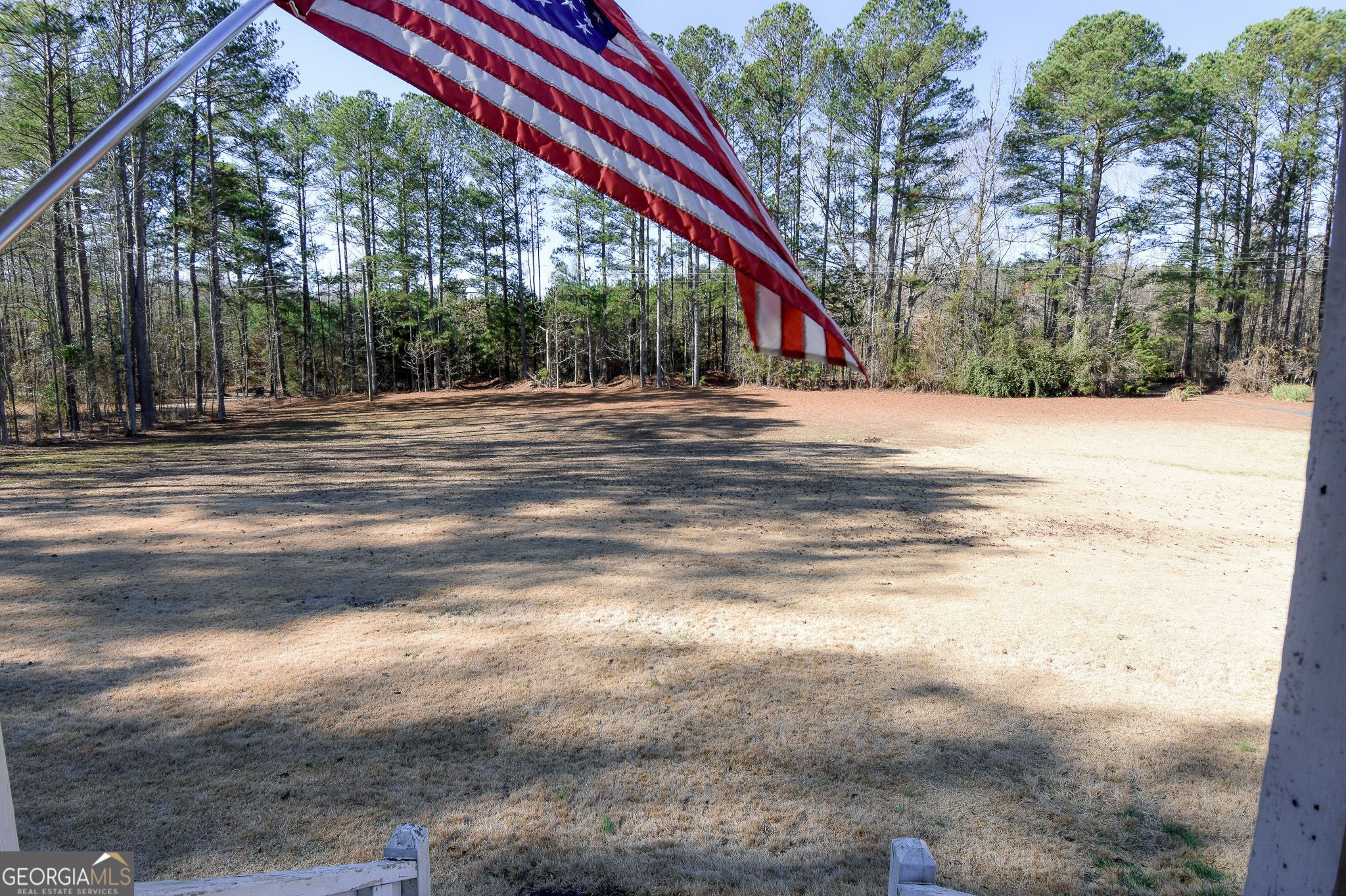 741 Howell Road Zebulon, GA 30295 - Photo 17 of 79 a view of street with large trees