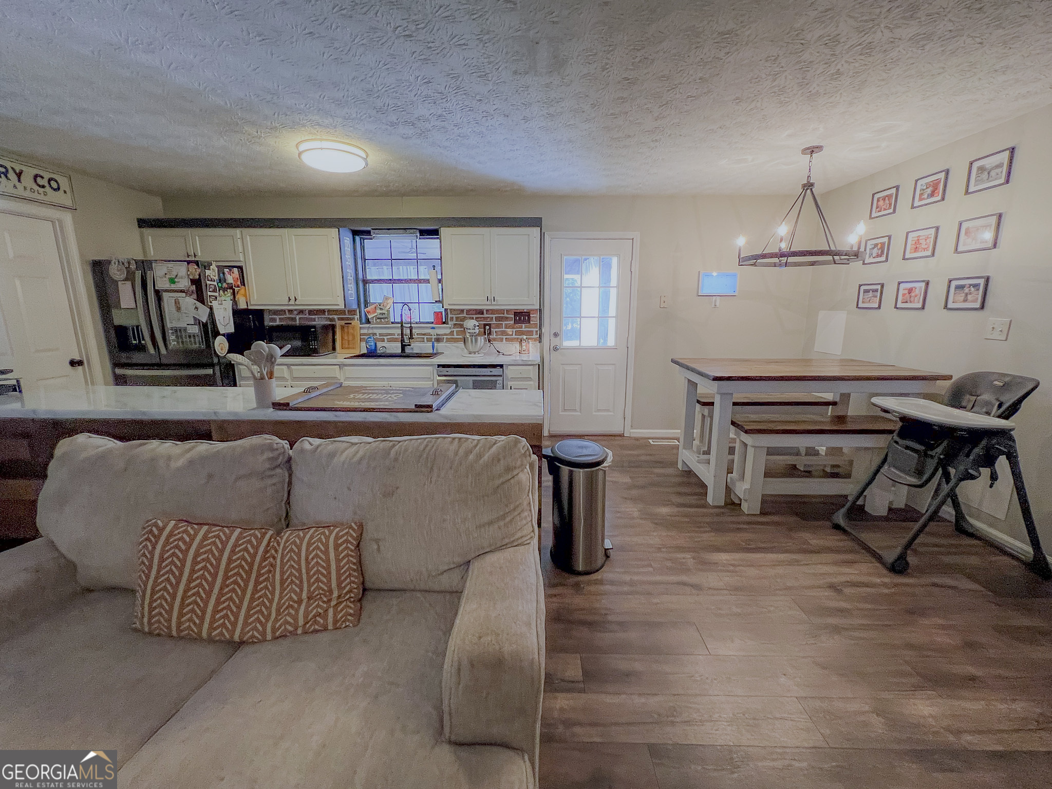 741 Howell Road Zebulon, GA 30295 - Photo 60 of 79 a living room with furniture and a piano