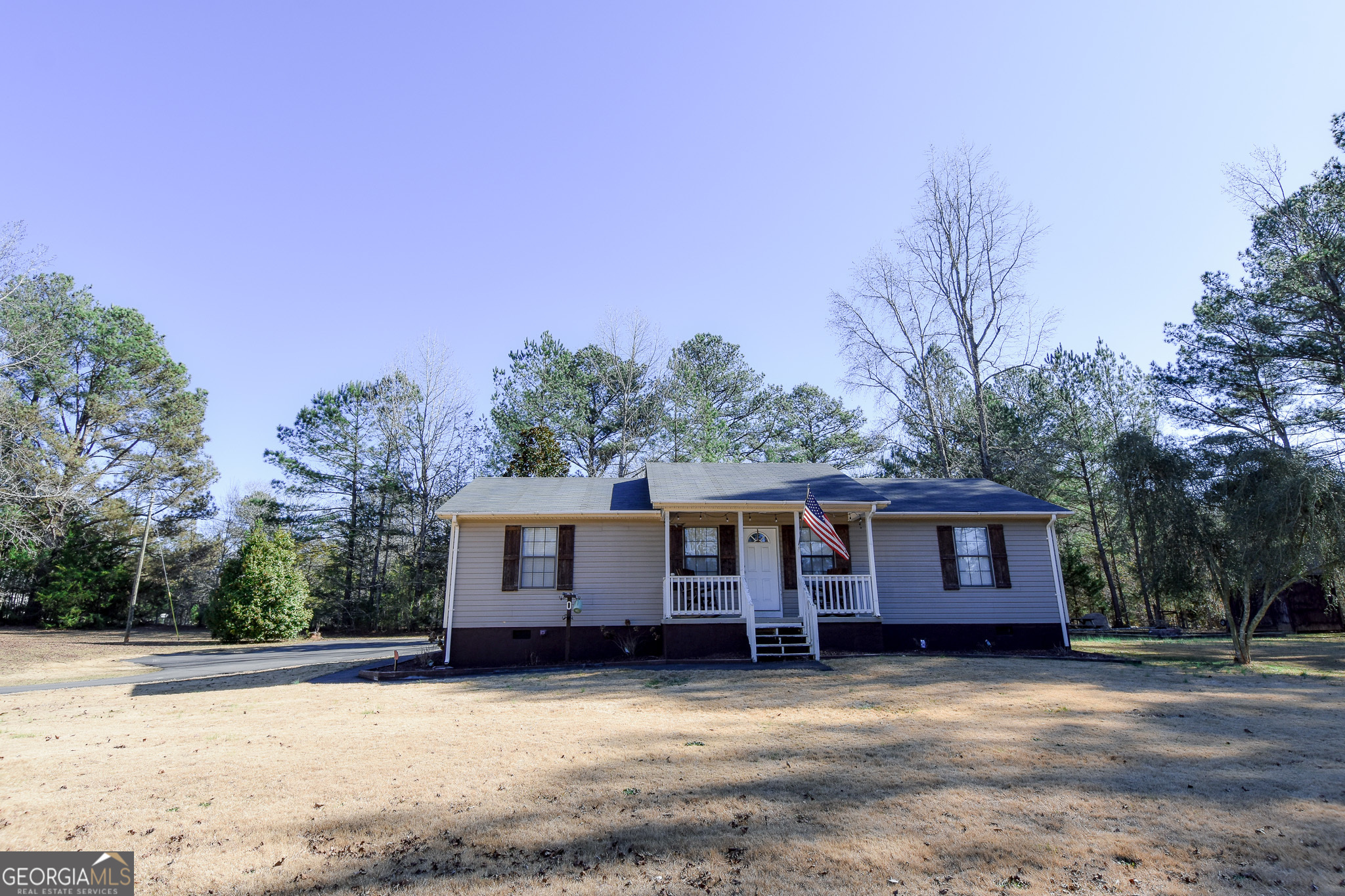 741 Howell Road Zebulon, GA 30295 - Photo 9 of 79 a view of a house with a yard