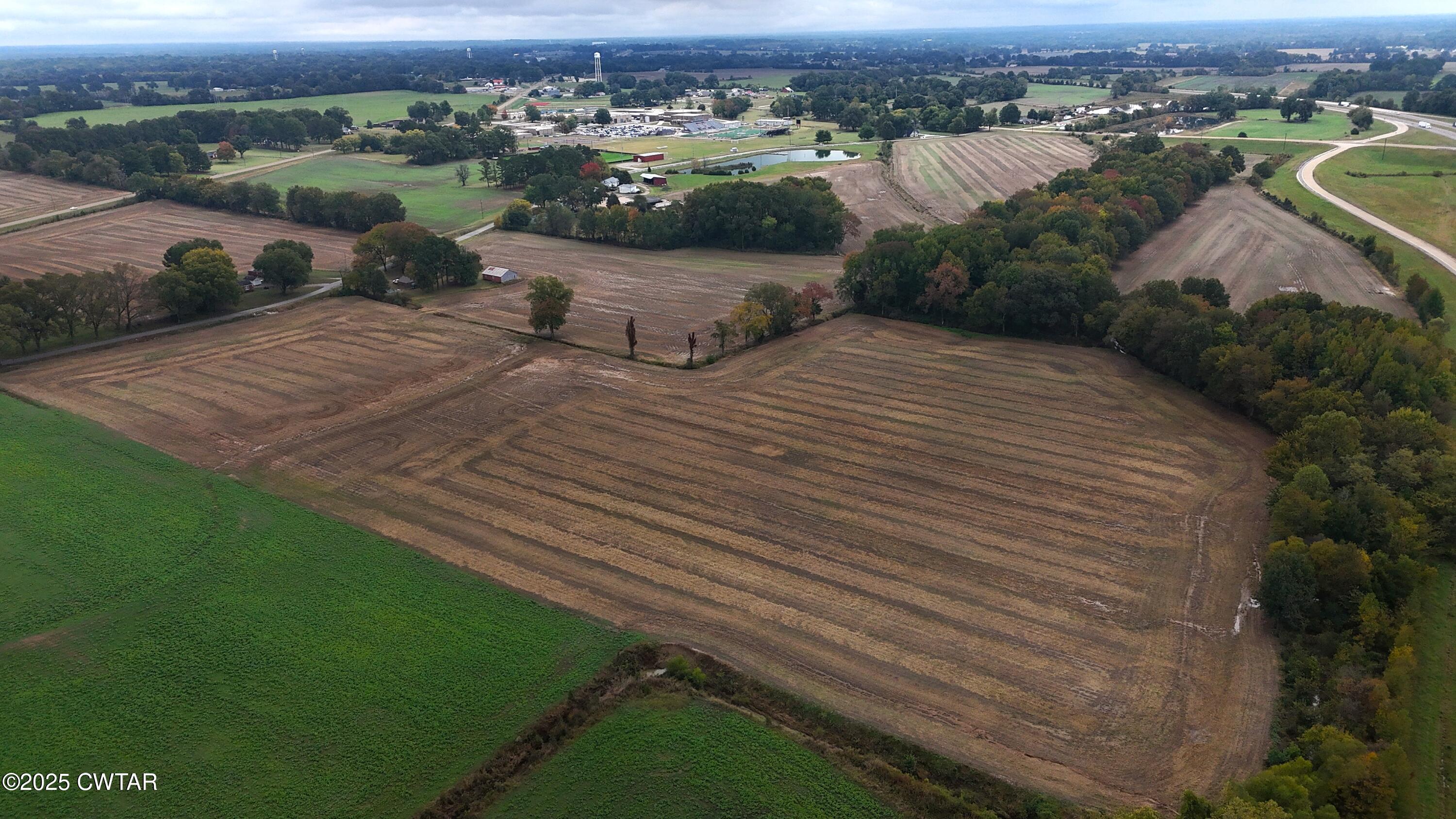 0 Lot Road Alamo, TN 38001 - Photo 11 of 12 an aerial view of a house with a yard