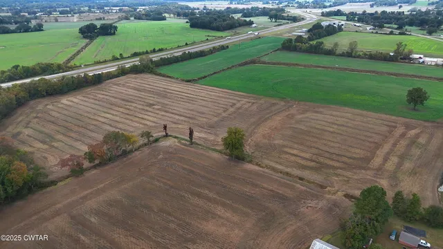 an aerial view of a house having yard