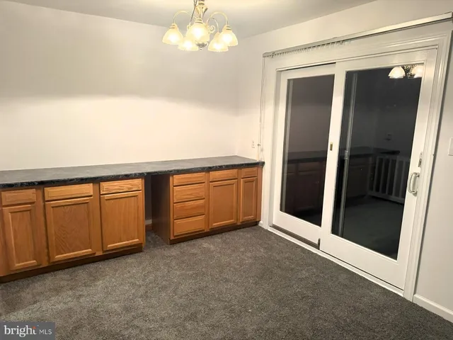 a bathroom with a toilet and a sink