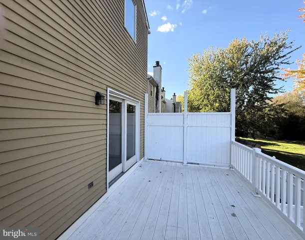 a view of a wooden fence
