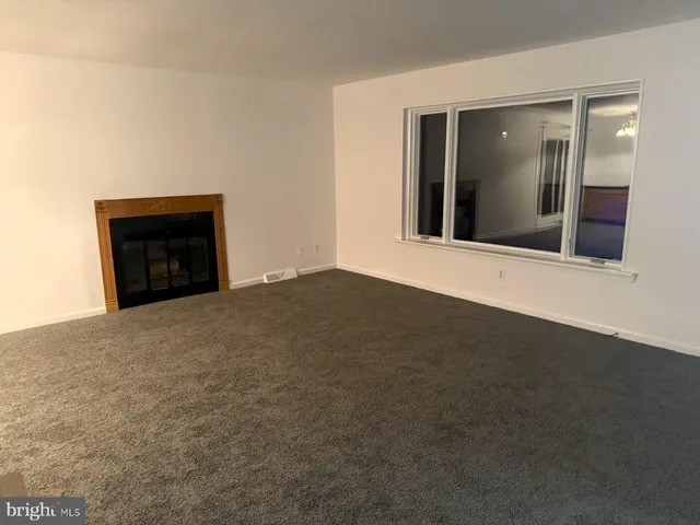 an empty room with window