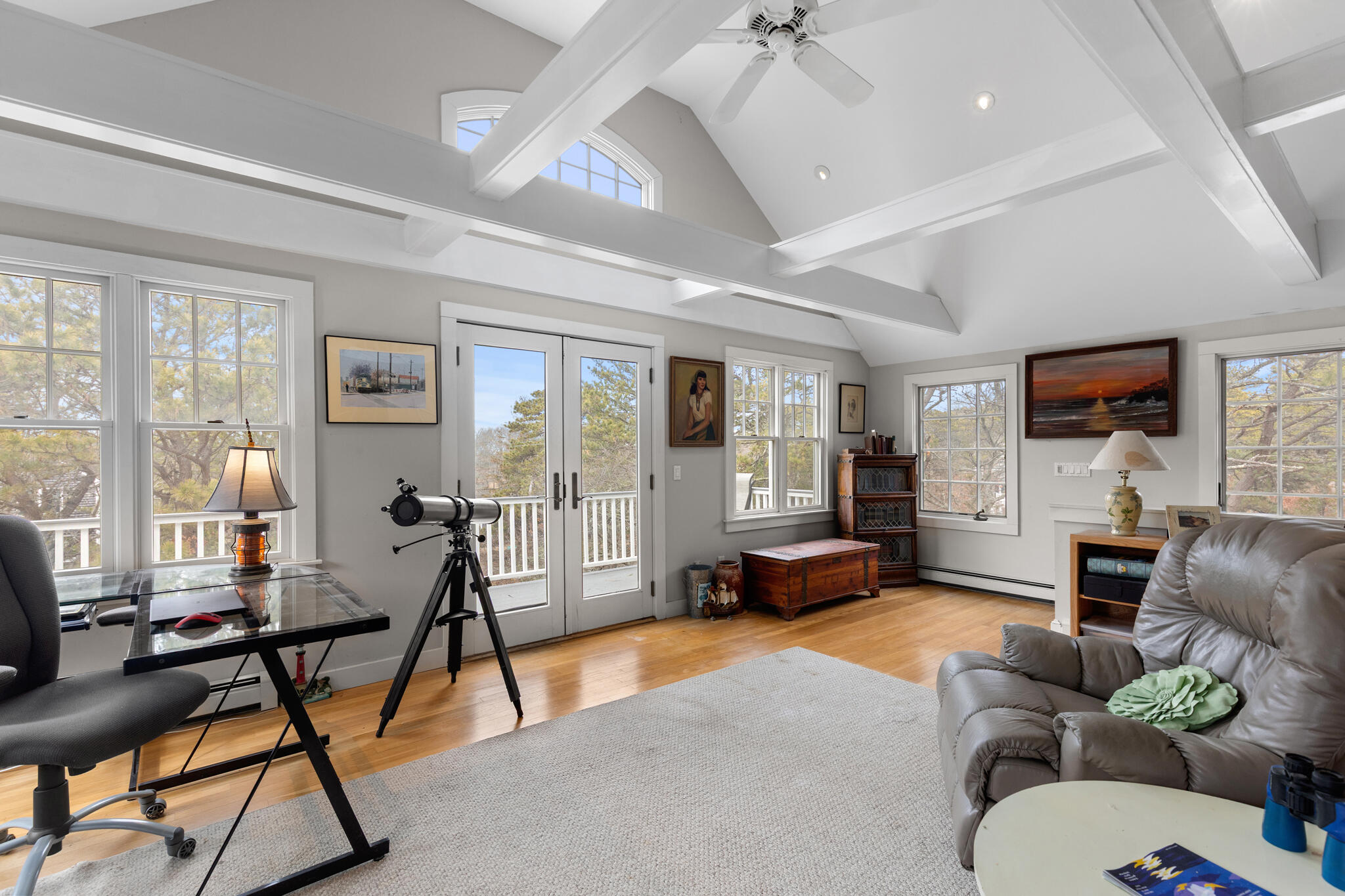 311 South Sunken Meadow Road Eastham, MA 02642 - Photo 33 of 57 a living room with furniture and a flat screen tv
