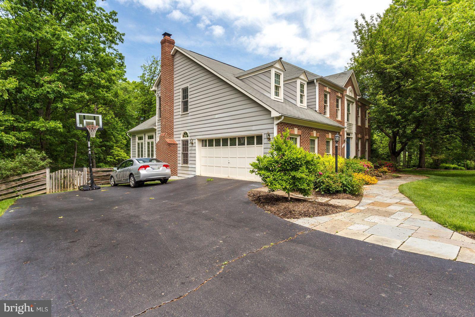 1237 Tottenham Court Reston, VA 20194 - Photo 30 of 30 Side Load Garage & Front Walkway