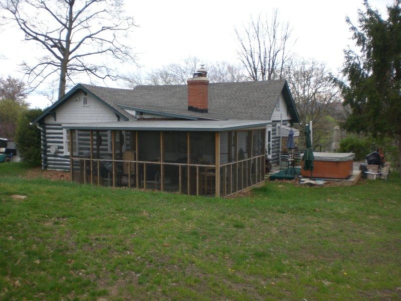 1706 Blue Ridge Springs Road Blue Ridge, VA 24064 - Photo 8 of 14 a view of a house with a yard
