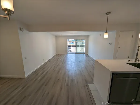 a view of a houses from a balcony