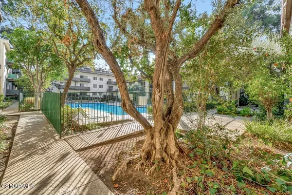 a view of a house with swimming pool
