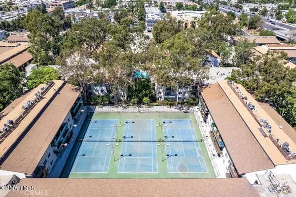 an aerial view of a city with lots of residential buildings