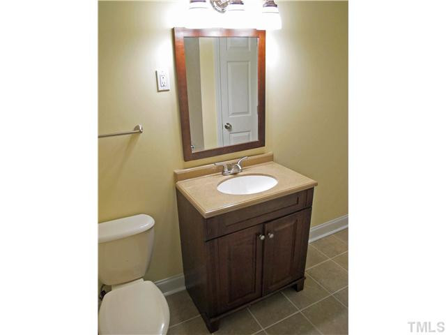 1706 Euclid Road Durham, NC 27713 - Photo 18 of 25 Hall Bath Updated with New Vanity and Tile Floors. Bathroom