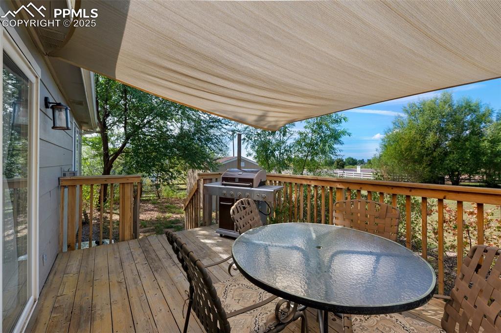 8534 Saddleman Road Peyton, CO 80831 - Photo 20 of 25 a view of a balcony with furniture