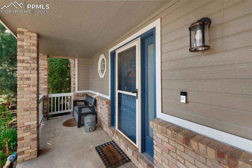 8534 Saddleman Road Peyton, CO 80831 - Photo 2 of 25 a view of balcony and patio