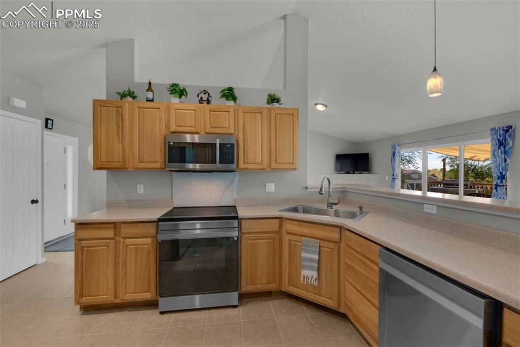 8534 Saddleman Road Peyton, CO 80831 - Photo 6 of 25 a kitchen with a sink and cabinets
