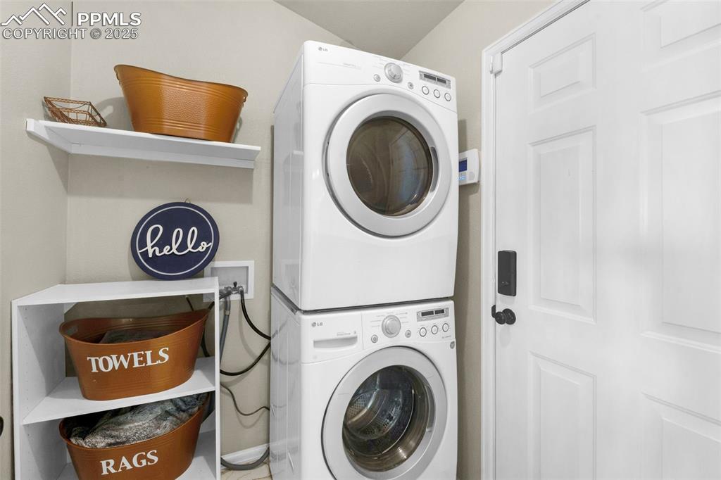 8534 Saddleman Road Peyton, CO 80831 - Photo 7 of 25 a view of washer and dryer in a utility room