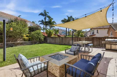 a view of a table and chairs in patio