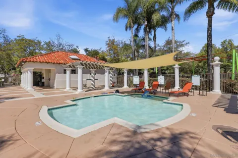 a view of outdoor space with seating area and trees