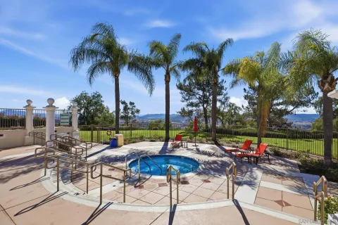 a view of a park with sitting area