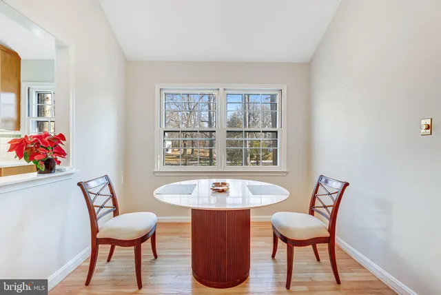 a view of a livingroom with furniture and windows