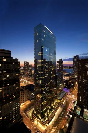 a kitchen with stainless steel appliances granite countertop sink stove top oven and cabinets