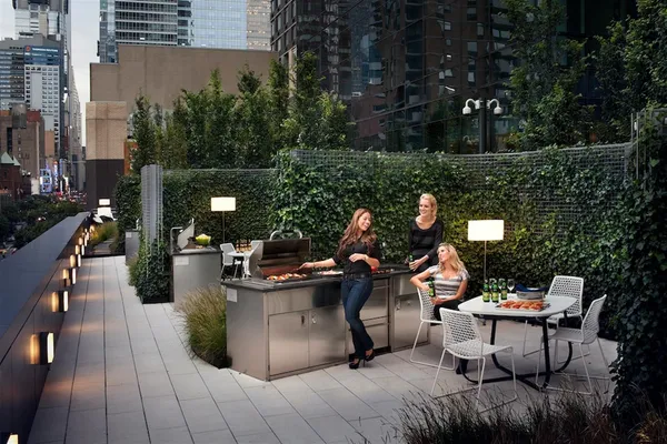 a living room with fireplace furniture and a large window