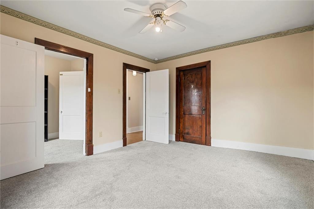 325 Walnut Street Vandergrift, PA 15690 - Photo 12 of 29 a view of an empty room and chandelier fan