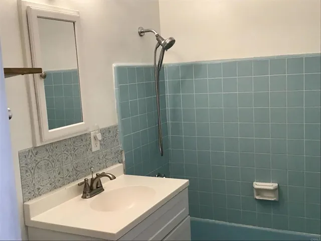 a bathroom with a sink a toilet