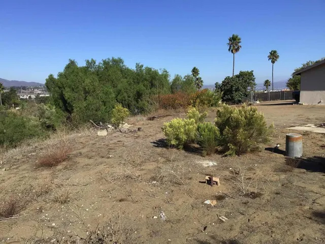 a aerial view of a house with a yard