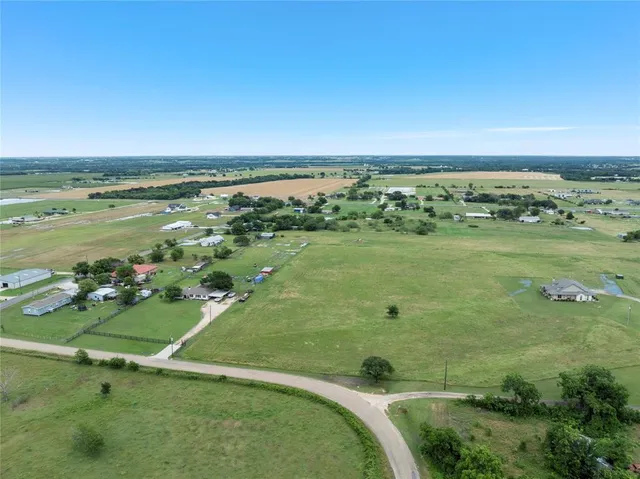 a view of a lake with a houses