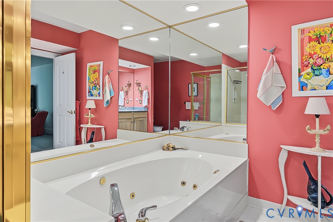 3131 Stony Point Road, Unit B Richmond, VA 23235 - Photo 59 of 65 Jetted soaking tub with chrome fixtures, large wal
