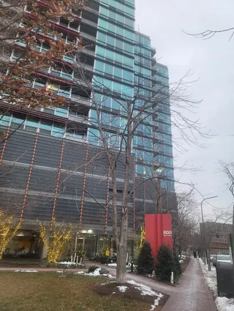 a view of a swimming pool and outdoor kitchen