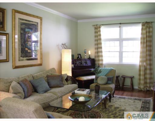 7 Taylor Road Monmouth Junction, NJ 08852 - Photo 4 of 10 a living room with furniture and a window
