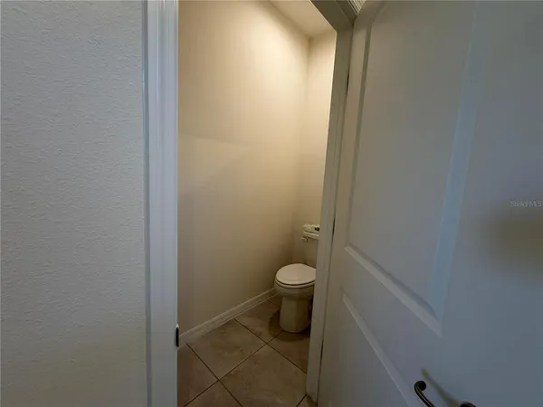 a bathroom with a toilet and a sink
