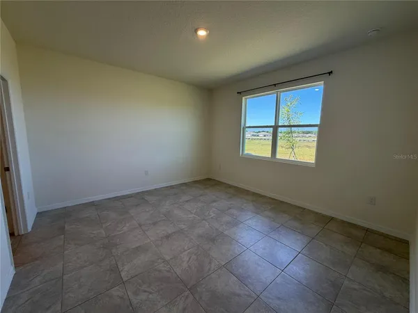 an empty room with a window