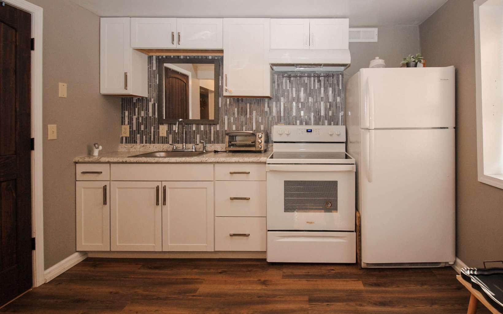 862 Walnut Ridge Ellijay, GA 30536 - Photo 4 of 11 a kitchen with stainless steel appliances granite countertop a refrigerator sink and stove