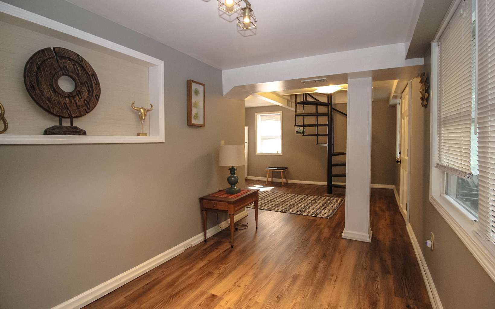 862 Walnut Ridge Ellijay, GA 30536 - Photo 6 of 11 a view of a livingroom with furniture and wooden floor