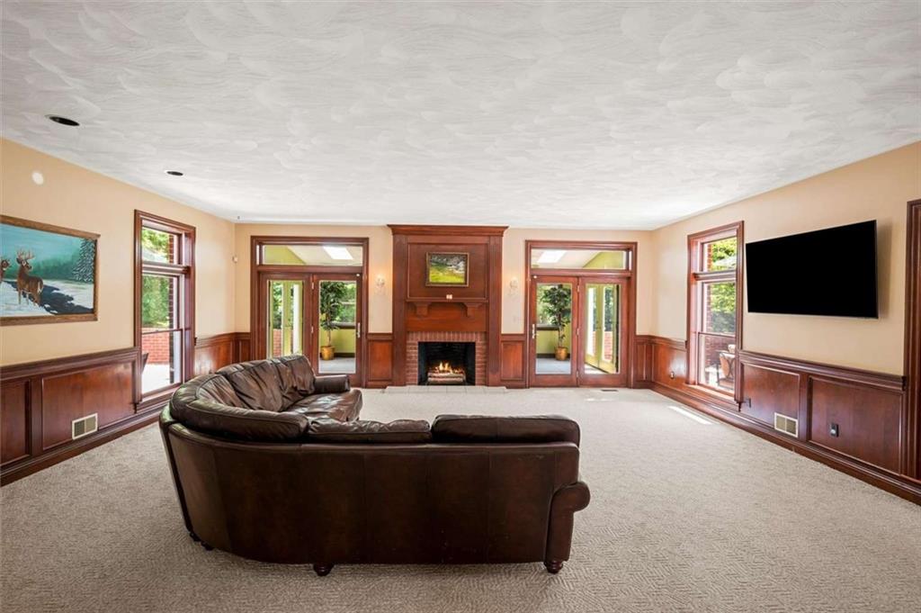 1702 Coulter Road Apollo, PA 15613 - Photo 21 of 50 a living room with furniture and a flat screen tv