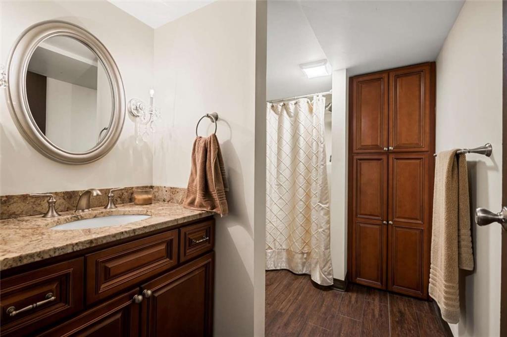 1702 Coulter Road Apollo, PA 15613 - Photo 47 of 50 a bathroom with a granite countertop sink and a mirror