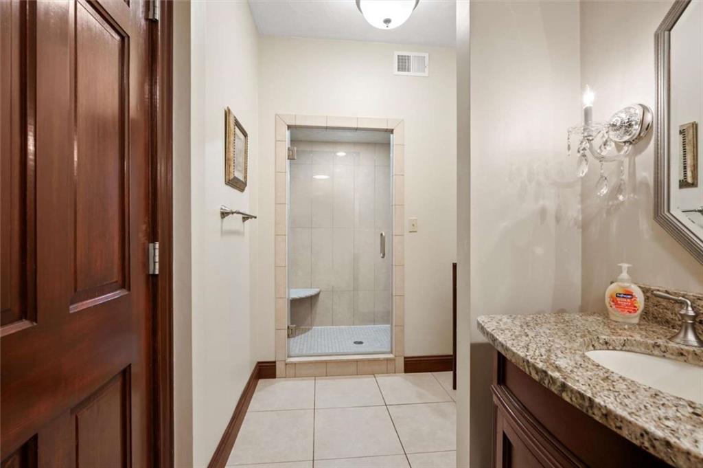 1702 Coulter Road Apollo, PA 15613 - Photo 50 of 50 a bathroom with a granite countertop sink and a mirror