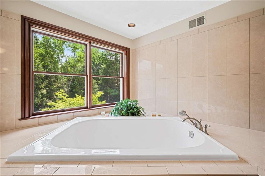 1702 Coulter Road Apollo, PA 15613 - Photo 9 of 50 a bathroom with a bathtub and window