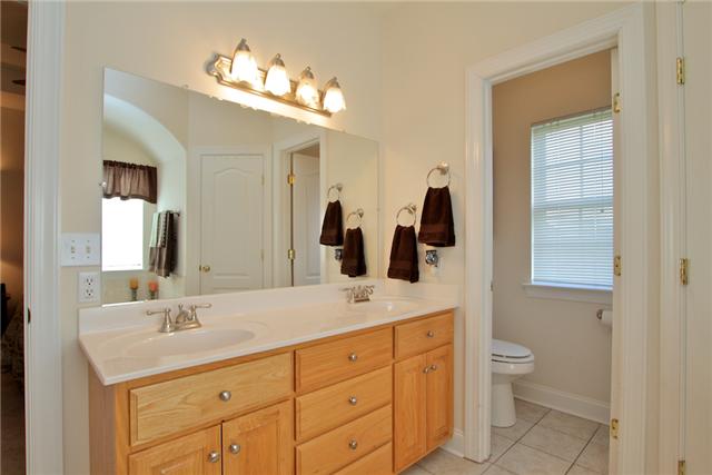 220 Ridgewater Way Mount Juliet, TN 37122 - Photo 12 of 18 a bathroom with a double vanity sink and a mirror