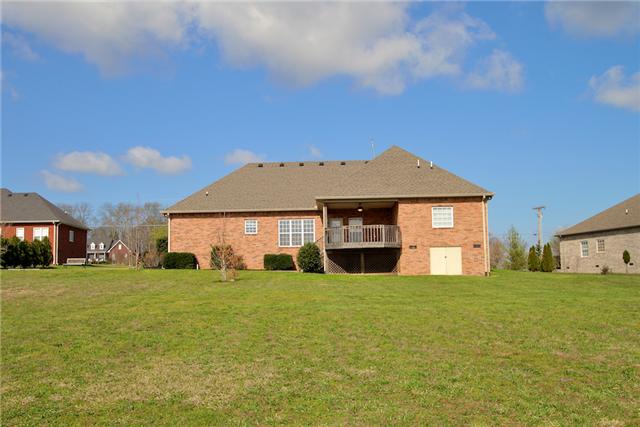220 Ridgewater Way Mount Juliet, TN 37122 - Photo 3 of 18 a view of a house with a yard and garage