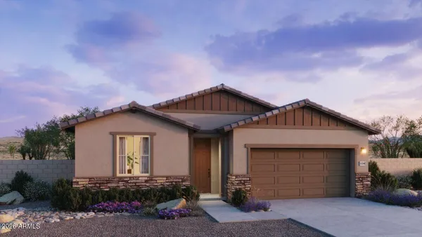 a front view of a house with a garage