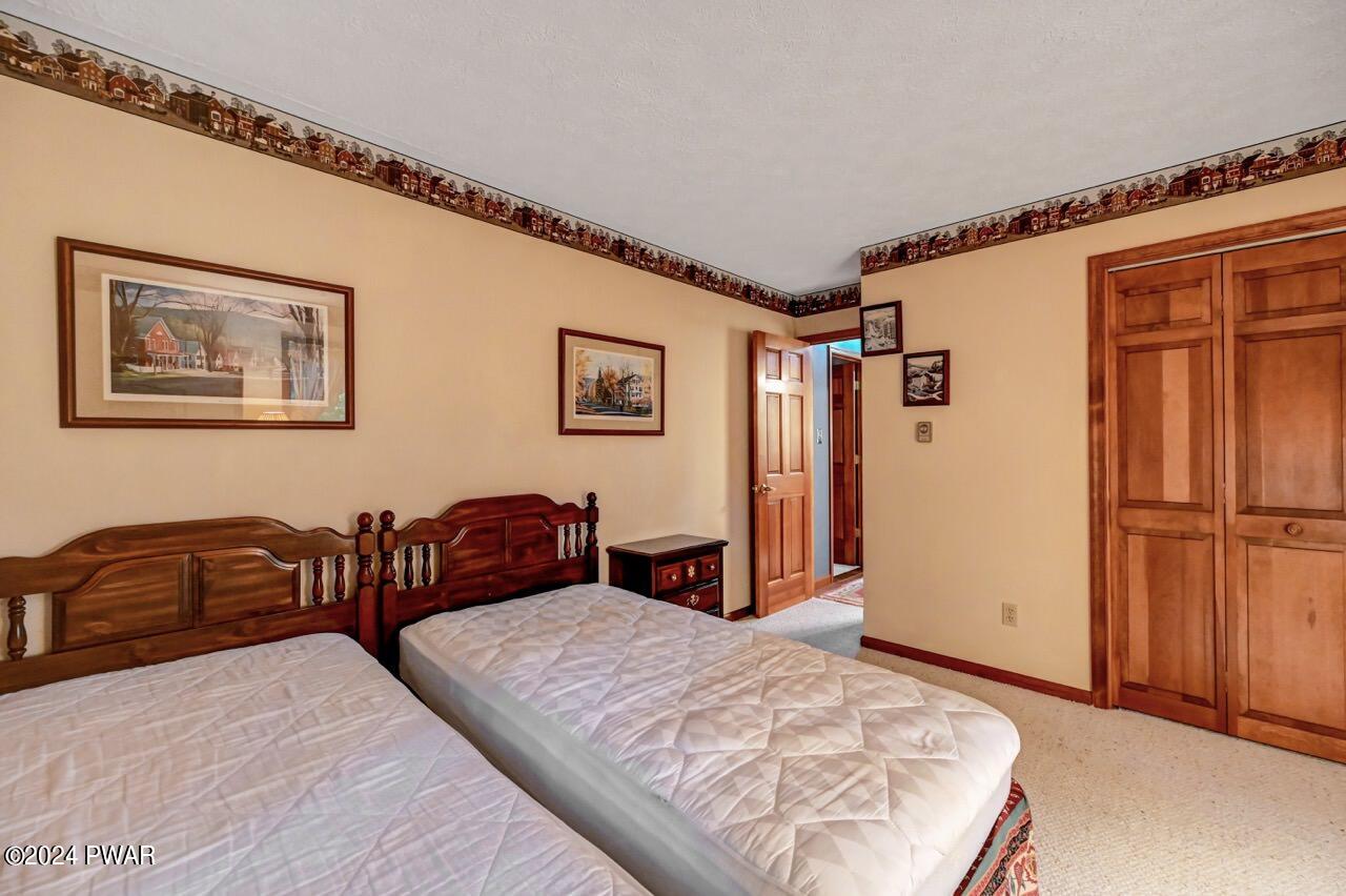 110 Valley Run Road Greentown, PA 18426 - Photo 38 of 67 a bedroom with bed and cabinet