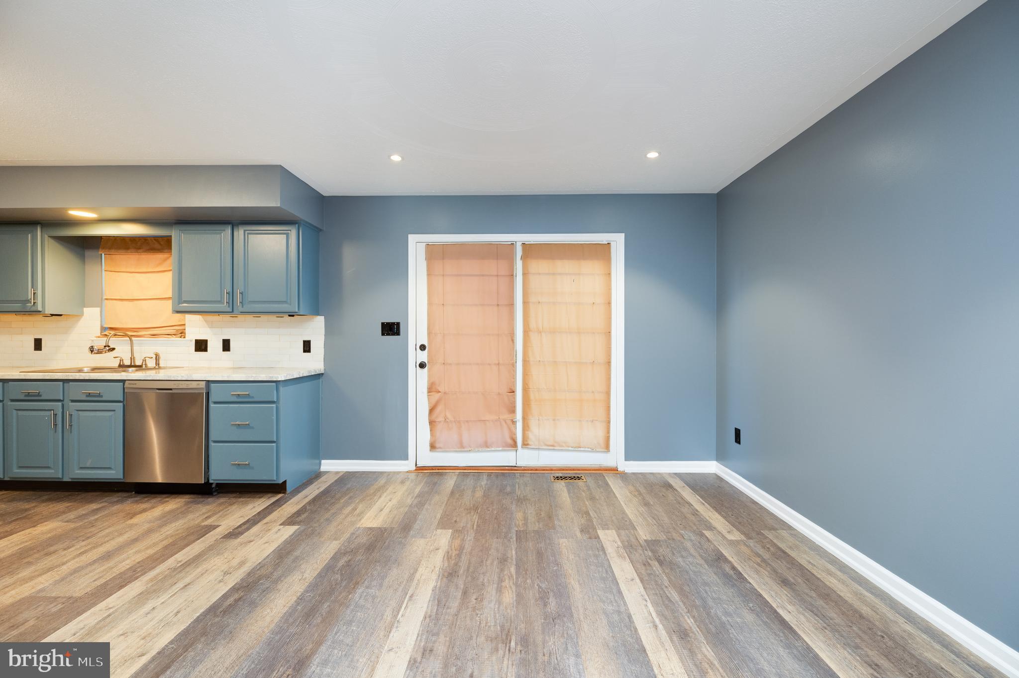 612 Frederick Street Reading, PA 19608 - Photo 8 of 33 a kitchen with a refrigerator and window