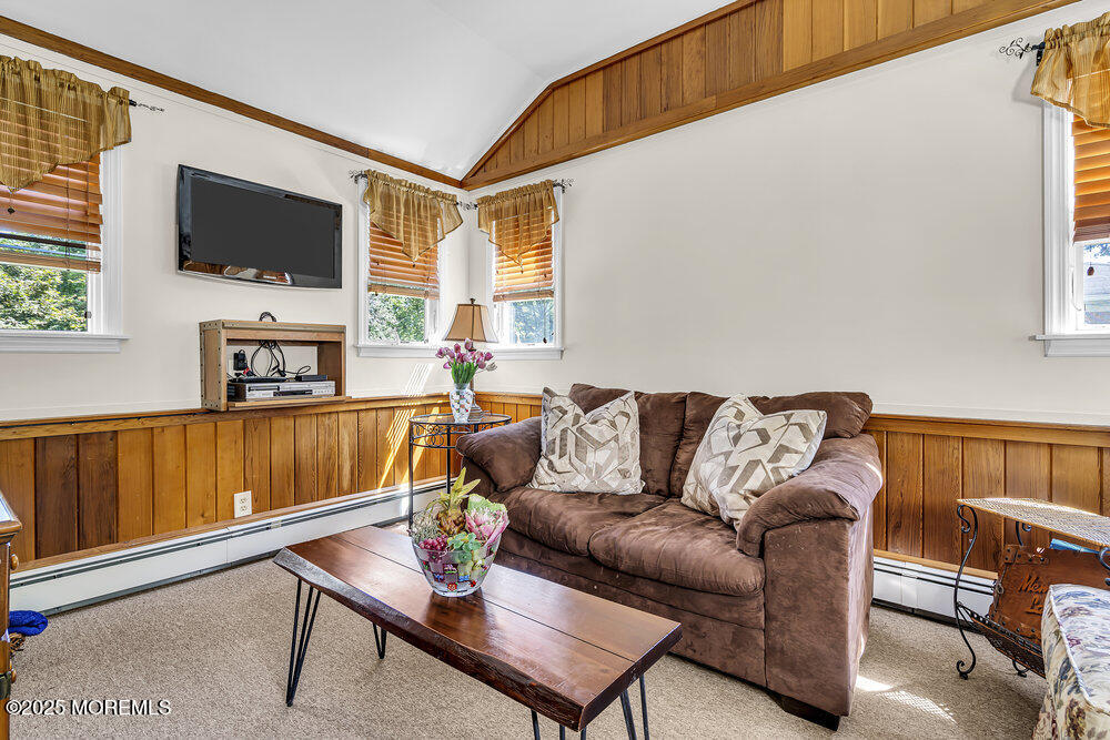 87 Amwell Road Hillsborough, NJ 08844 - Photo 14 of 46 a living room with furniture and a flat screen tv