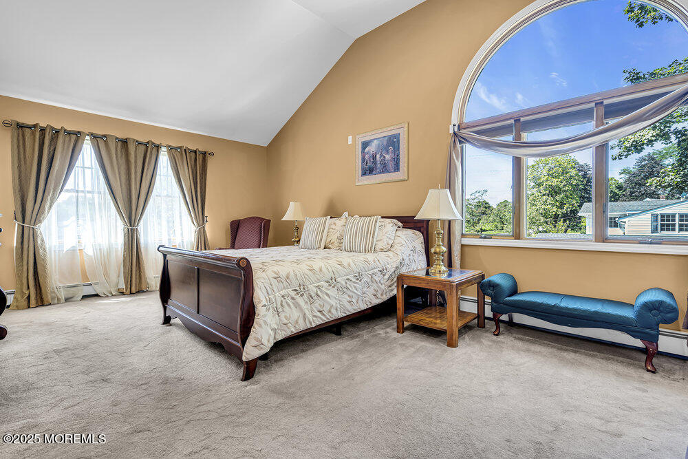 87 Amwell Road Hillsborough, NJ 08844 - Photo 19 of 46 a bedroom with bed and a large window