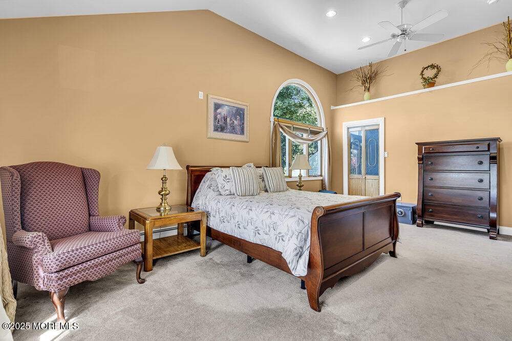 87 Amwell Road Hillsborough, NJ 08844 - Photo 20 of 46 a bedroom with a bed and a couch